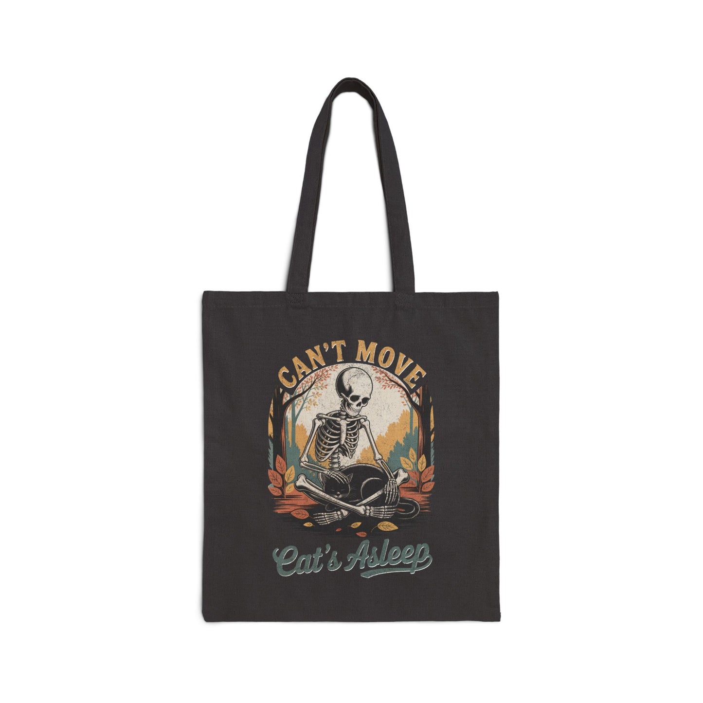 Relaxed skeleton cradling black cat with eyes closed – cozy gothic fall tote bag by SkeletonWear Apparel