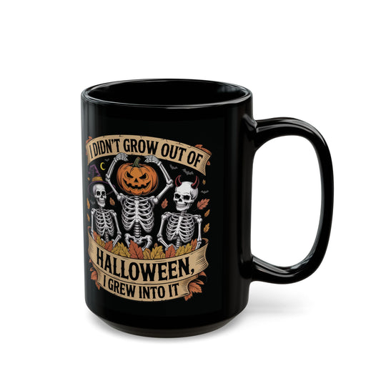 Skeletons with pumpkin, witch hat, and devil horns under banner ‘I Didn’t Grow Out of Halloween, I Grew Into It’ – SkeletonWear Apparel Halloween mug design